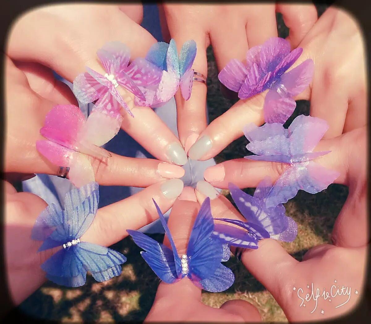 Peri Kancing Pengantin Tepi Laut untuk Menghabiskan Liburan Sepasang dari Lapisan untuk Meniru Mimpi Colorful Butterfly bukaan Cincin Bunga Ekor Benar Kasa untuk Berhenti Dekorasi